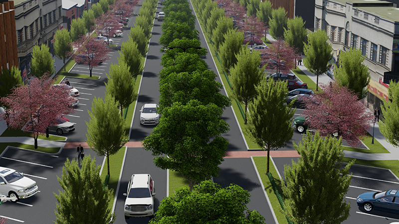 An aeriel rendering of a preliminary design concept which includes a landscaped median, landscaped planting strips, back-in angled parking, and new businesses along the corridor.
