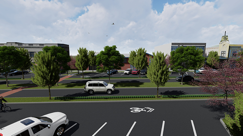 A rendering shows one general traffic lane in each direction. The parking area is separated from the general traffic lane by a landscaped planting strip. This area can be used by cyclsits.