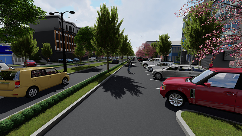 The parking area is marked with sharrows which help indicate that the road is shared by people driving and biking.